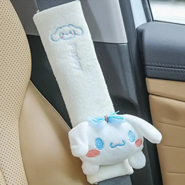 Comfy cartoon seat belt pad featuring plush design for shoulder protection and playful style in a car.